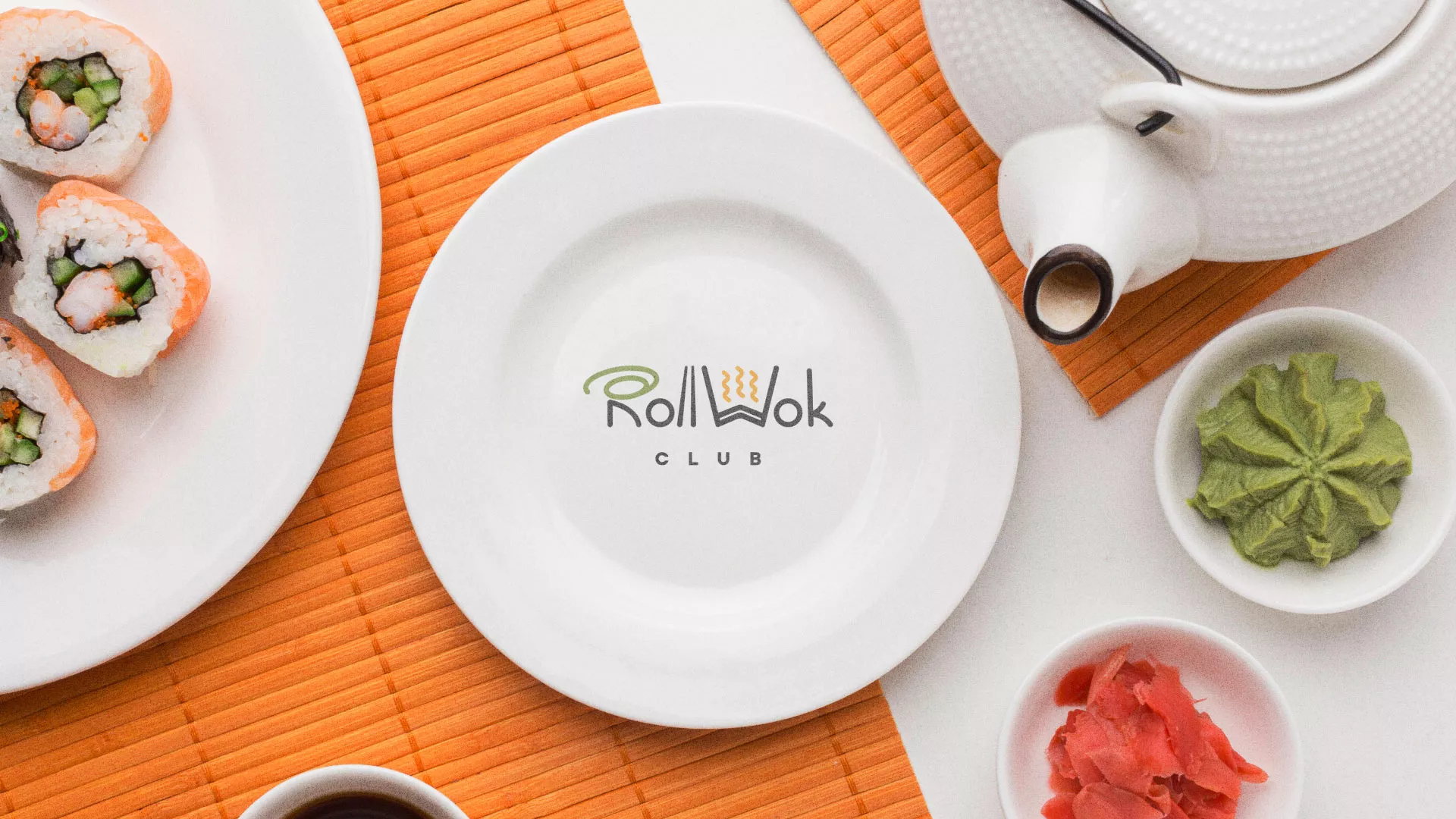 Разработка логотипа и фирменного стиля суши-бара «Roll Wok Club» в Мариинске